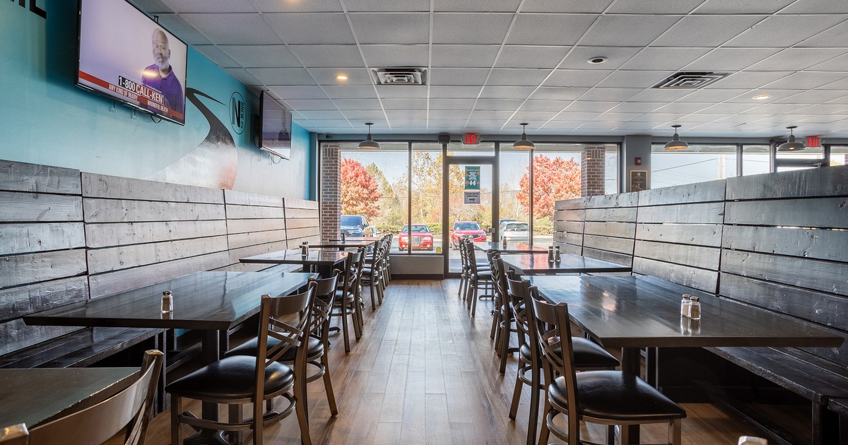 Interior, seating area, lined up tables