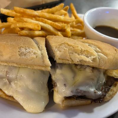 Steak Sandwich with fries.