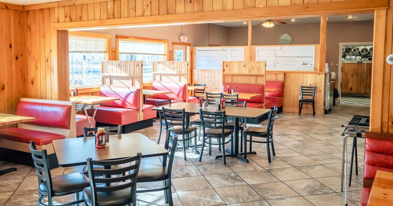 Interior, dining area, tables ready for guests