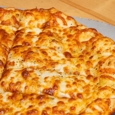 Cheesy Breadsticks pizza, close up.
