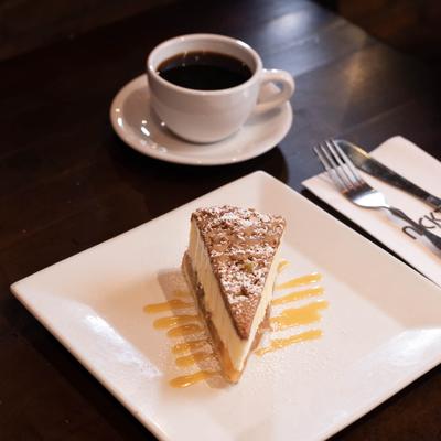 Cheesecake, with a cup of coffee.
