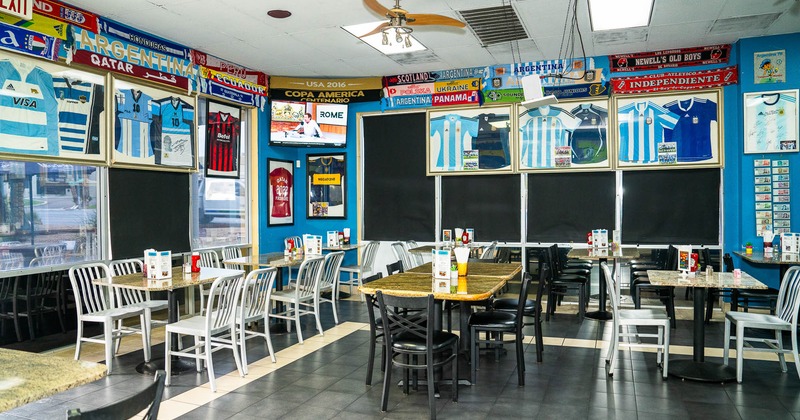 Interior, main seating area, soccer jerseys on the wall