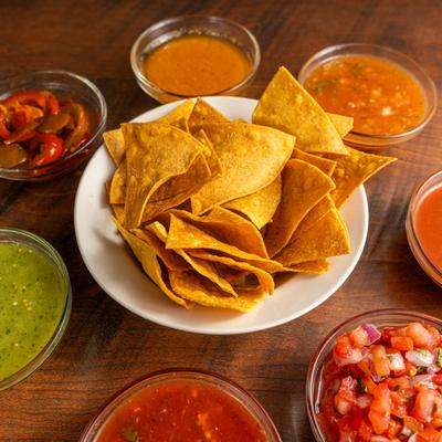 Tortilla chips with assorted salsas.
