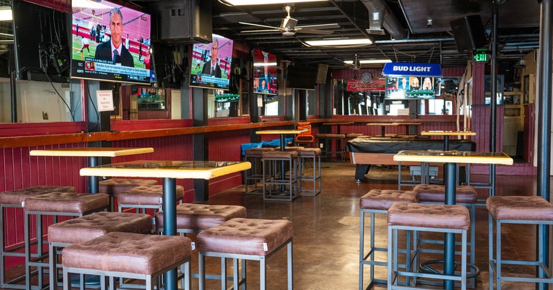 Interior, seating area with tv screens