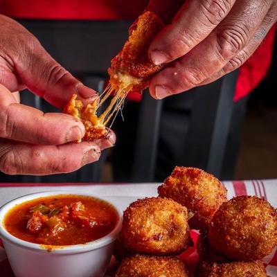 Risotto Bites with marinara on the side.