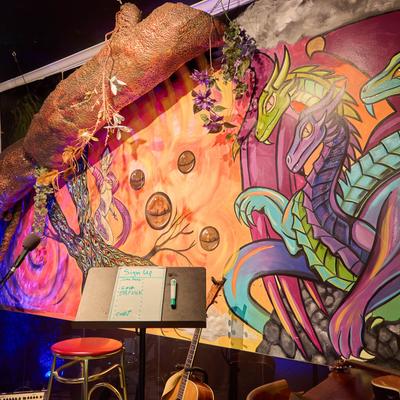 A fantasy drawing on the stage wall.