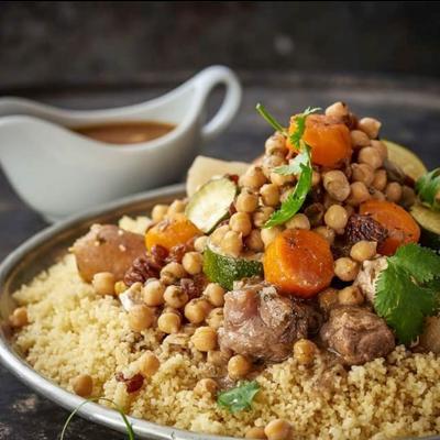 Couscous dish with gravy on the side