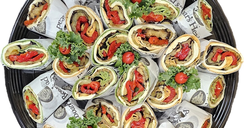 A platter of Mediterranean style vegetarian wraps