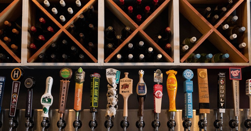 Interior, wine racks and beer taps, closeup