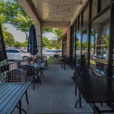 Covered patio, seating area.