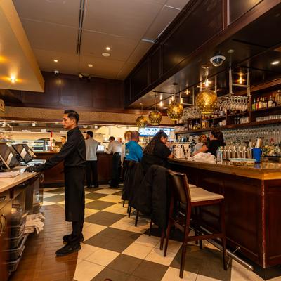 Interior, ambiance, guests and staff in action.