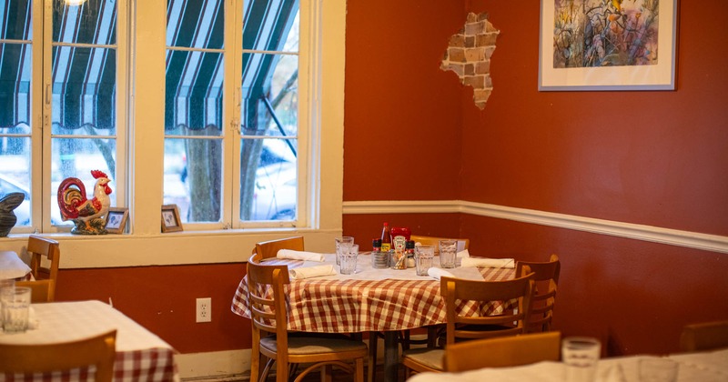 Interior, set table and chairs next to the window