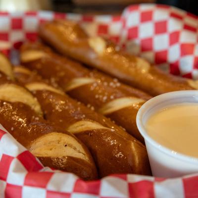 Salted Pretzel Sticks served with beer cheese.