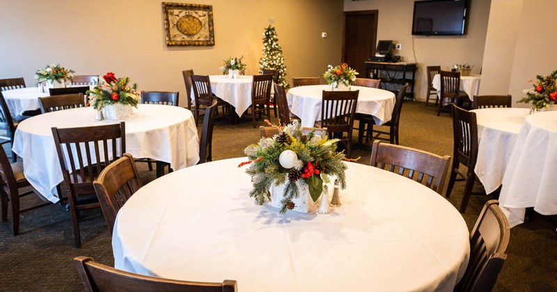 Interior, tables decorated with Christmas details