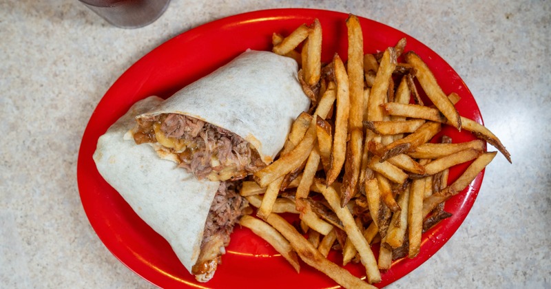 Brisket and Mac and Cheese wrap with a side of fries