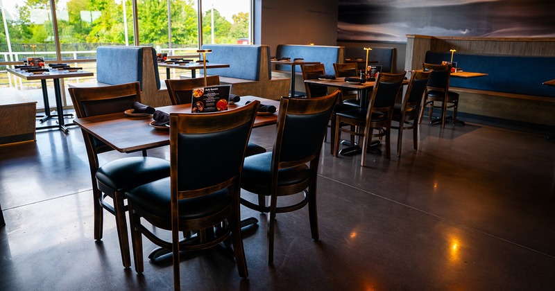 Interior, dining area with set tables ready for guests