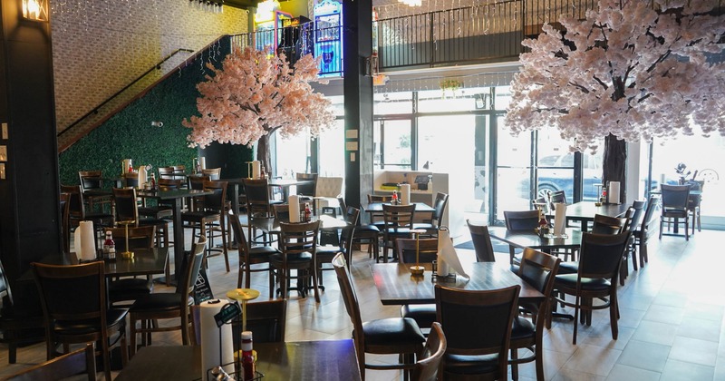 Interior, seating area with big pale pink trees