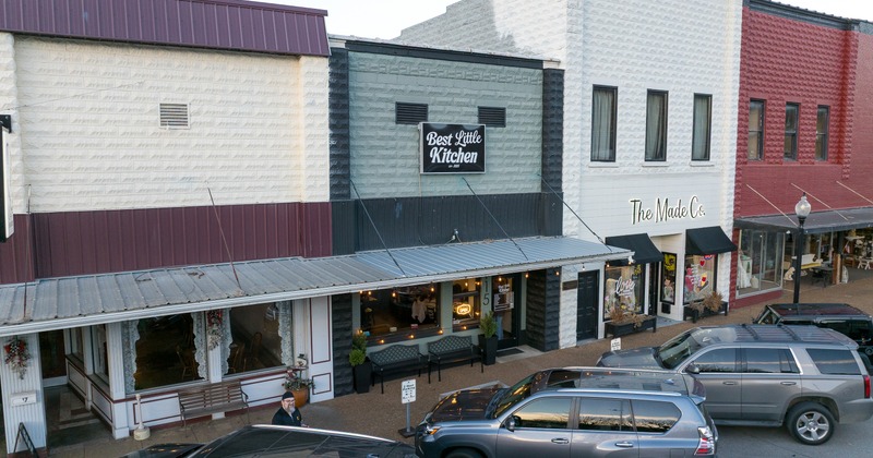 Exterior, angle up view to restaurant and parking lot