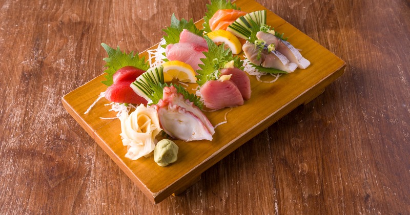 Sashimi Combo platter served on a wooden tray