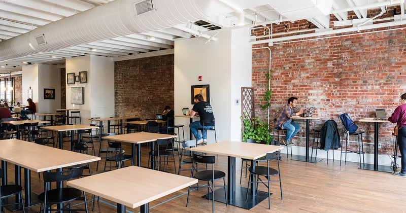 Interior, upstairs seating area, guests using their laptops