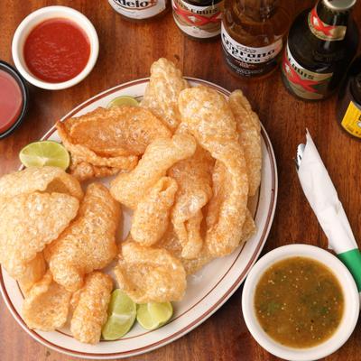 Fried pork rinds with salsa verde.