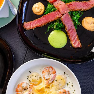 Lobster ravioli with shrimp, and Tuna Tataki.