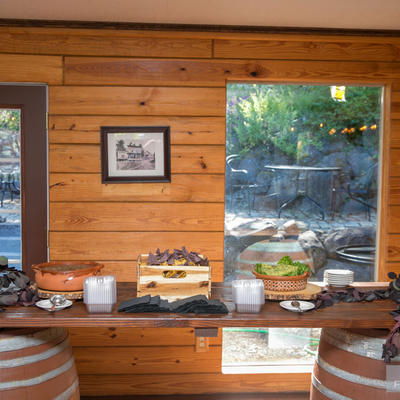 Table with nachos, windows in the back