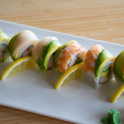 Rainbow rolls, topped with tuna, salmon, white fish, shrimp, and avocado.