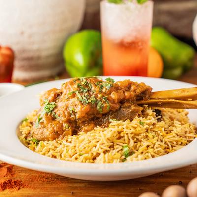 Lamb Shank and seasoned rice.