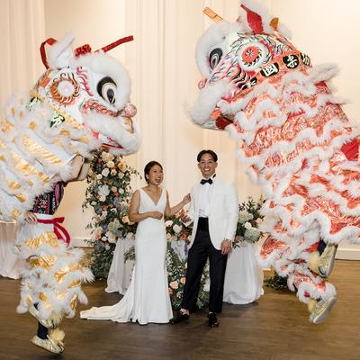 The bride and groom posing for a photo.