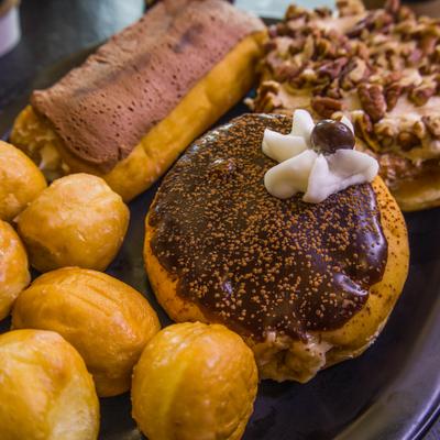 Assortment of sweet baked goods served together on the plate.