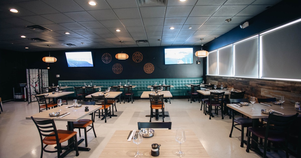 Interior, spacious dining area with tables and chairs