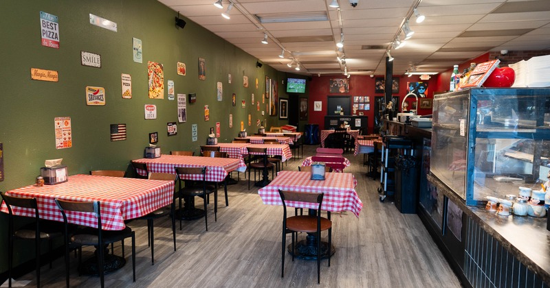 Interior, tables and chairs in dining area