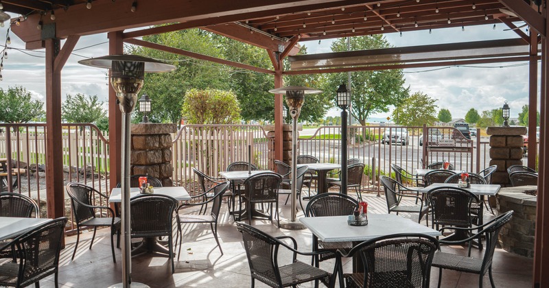 Exterior, tables and chairs on covered patio