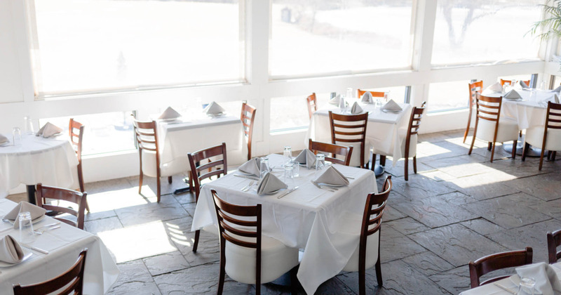 Interior, tables set with tableware