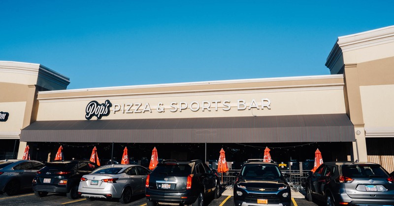 Exterior, front view to the restaurant, part of parking lot