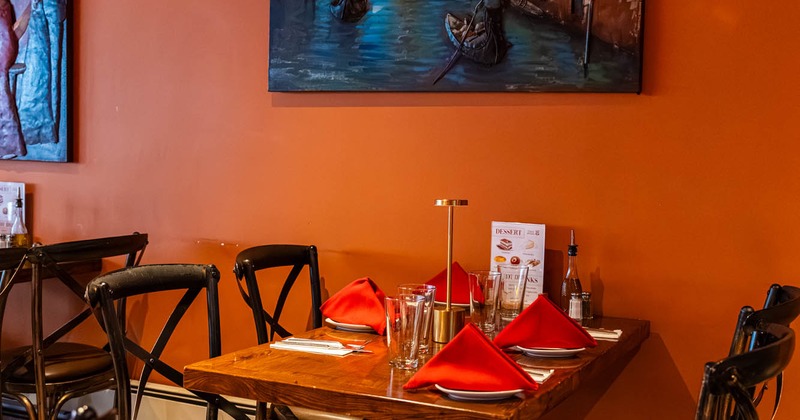 Interior, table and chairs, picture on the wall