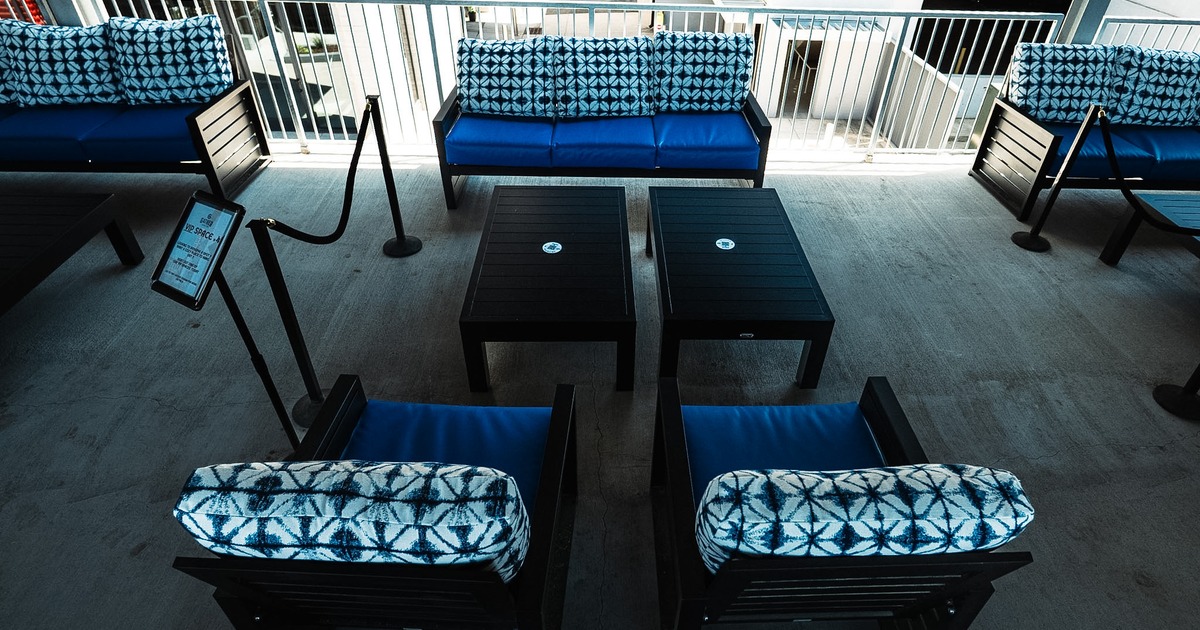 Blue leather sofa and armchairs