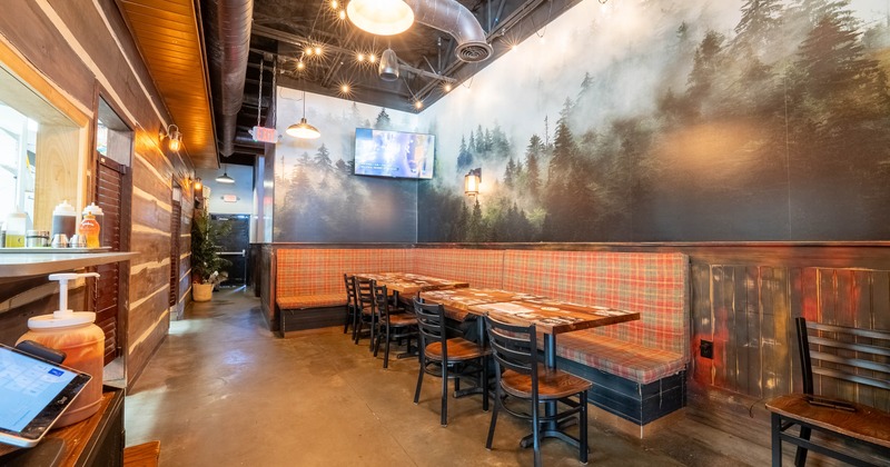 Interior,  banquette seating with tables and chairs