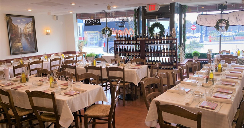 Restaurant interior, main dining area with set dining tables