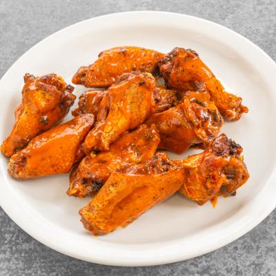 Plate of Buffalo chicken wings.