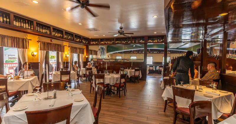 Interior, dining area, fully set tables