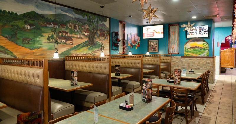 Interior, dining area, seating booths with tables, regular tables for four and eight