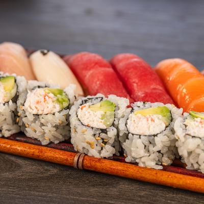California roll served with assorted nigiri sushi.