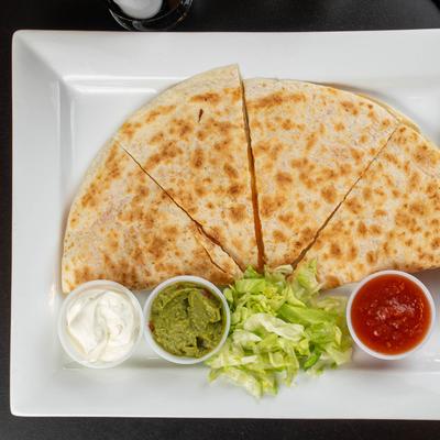 Quesadillas served with sour cream, guacamole and salsa.