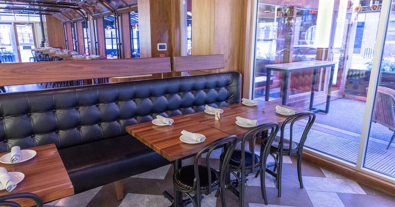 Interior, seating area, the mirrored wall behind the seats