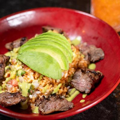 Boca Bowl, with steak, rice, corn, pico de gallo, and avocado.