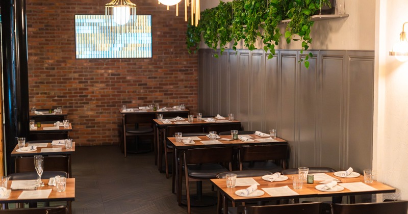Interior of a restaurant with wooden tables