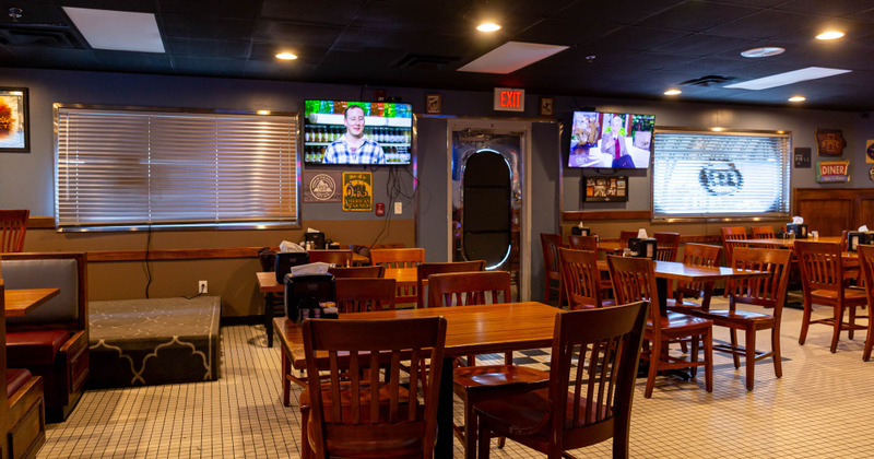 interior, tables ready for guests, wall tv