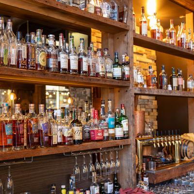 Various bottles on shelves.